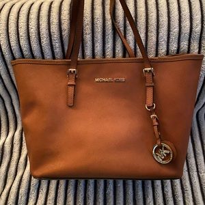 MK purse, don’t use just sits in the closet.